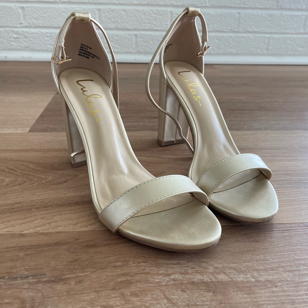 Lulu’s gold heel
